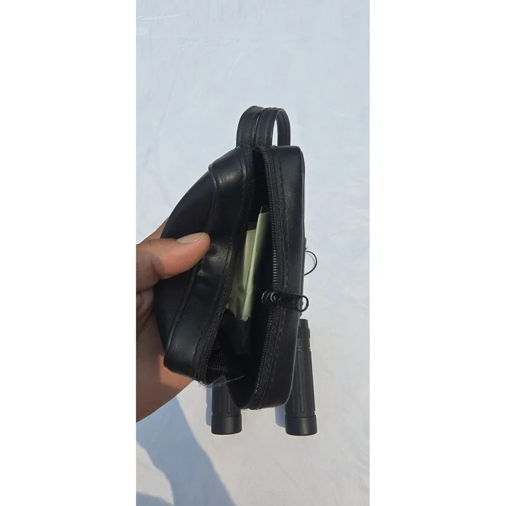 Tasco 10x25 compact binoculars With Case